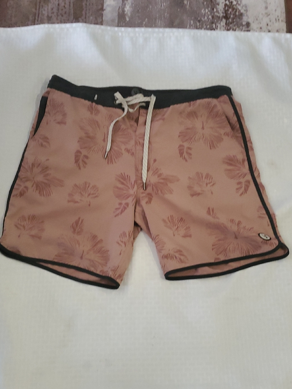 Vuori Thrash Rose Pink Floral Swim Trunks with Black Trim